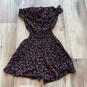 Sleeveless Black Romper with Red Floral Design